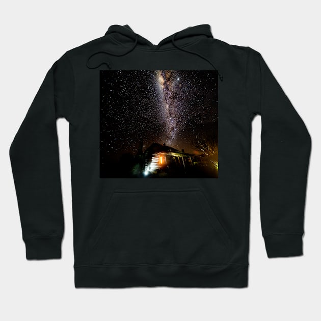 Milky Way over a log cabin Hoodie by dags